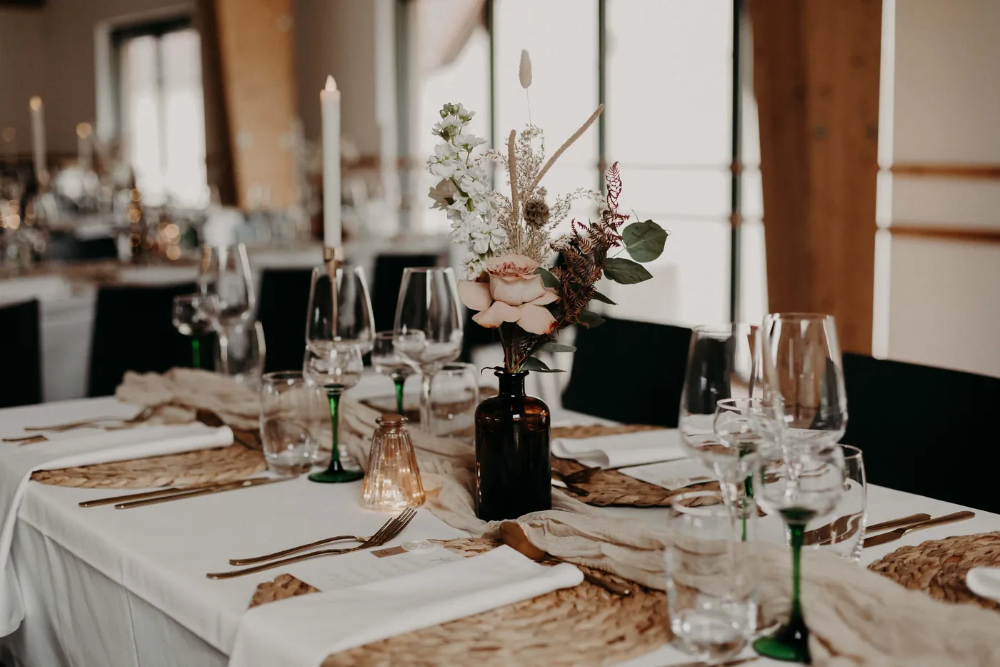 Wedding table set with candles and flowers in Alsace